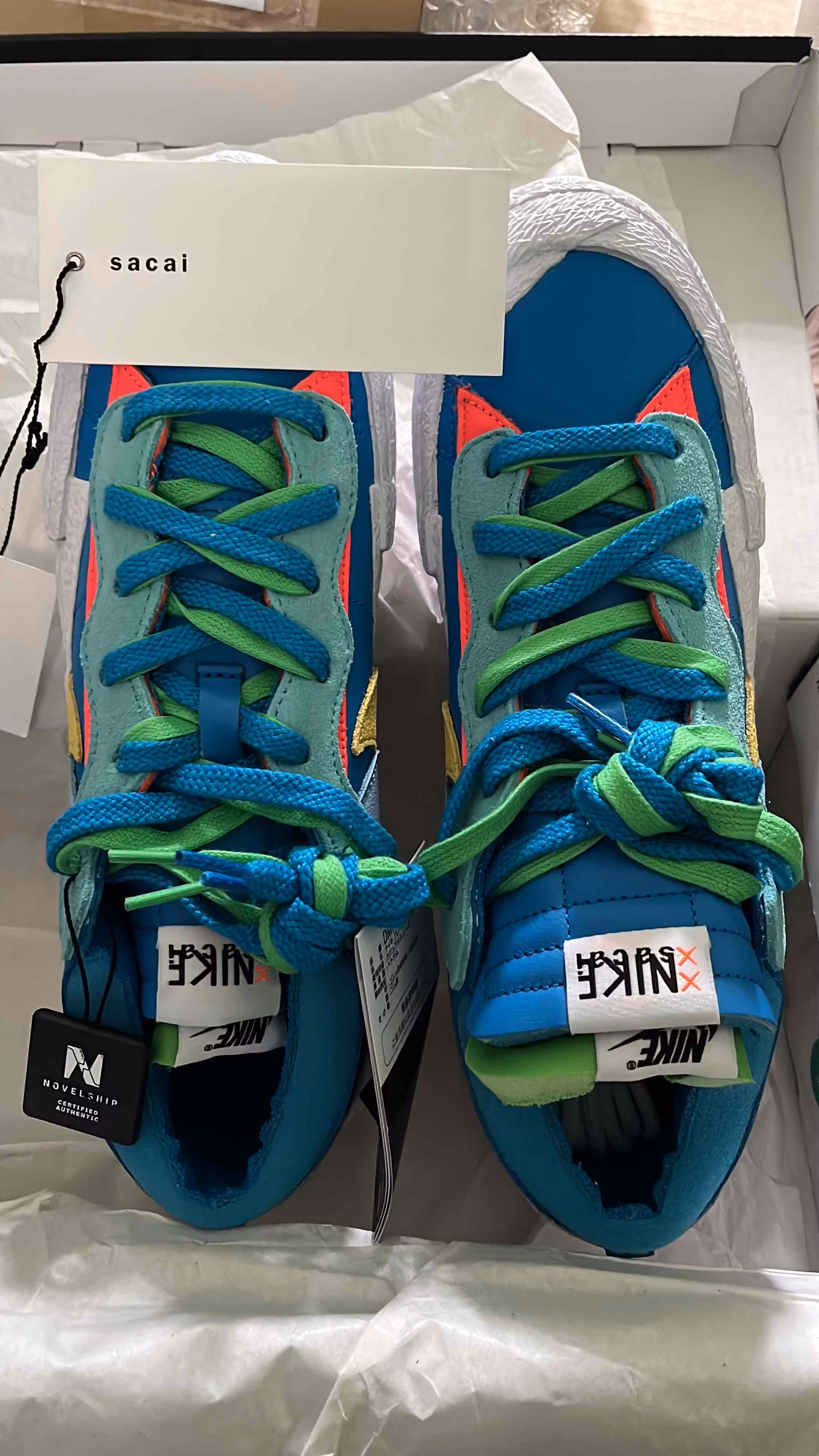 KAWS x sacai x Nike Blazer Low 'Neptune Blue' DM7901-400 KAWS x sacai x Nike Blazer Low 'Neptune Blue' DM7901-400